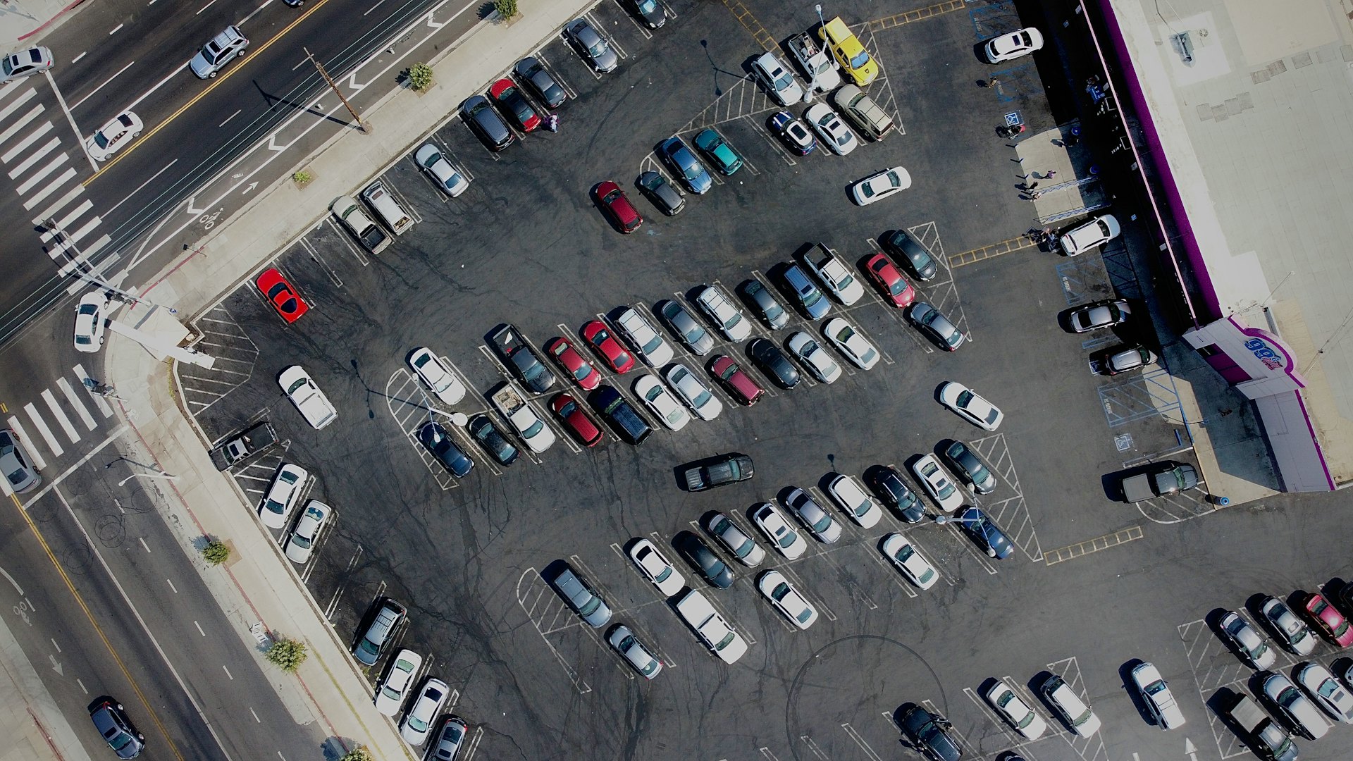 Crowded airport parking lot in spring season